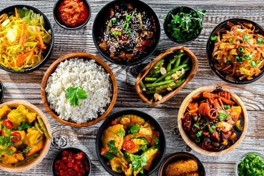 Composition with variety of east asian dishes.