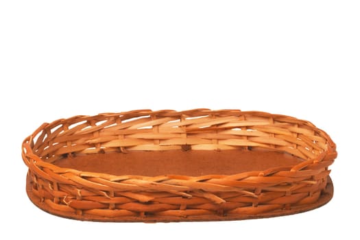 Empty wicker basket isolated on a white background. For your food and product display assembly. Macro of a straw basket.