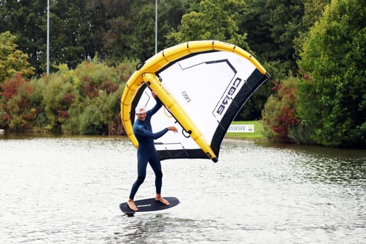 Kitsurfer Ben Benholz showed fascinating trend sports,such as pump and wing foiling,on the trade fair lake.   The Interboot 2024 Friedrichshafen trade fair will open its doors on 25.09.2024