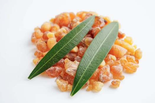 Frankincense or olibanum aromatic resin isolated on white background used in incense and perfumes.