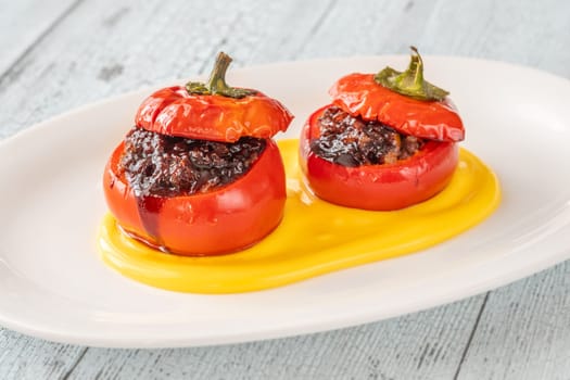Red bell peppers stuffed with ground beef