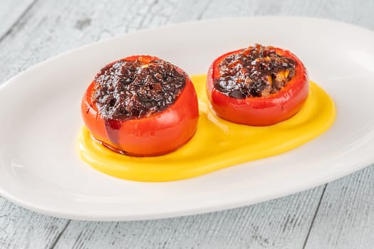 Red bell peppers stuffed with ground beef