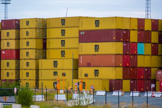 Antwerp, Belgium, September 22nd 2024: Illustrative Editorial: View on MSC containers stacked at cargo terminal in the port of Antwerp, Belgium