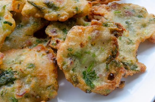 Close up view of vegetable fritters from above.