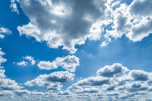 Beautiful blue sky and white cumulus clouds abstract background. Cloudscape background. Blue sky and fluffy white clouds on sunny days. Blue sky and daylight. World Ozone Day. Ozone layer. Summer sky.