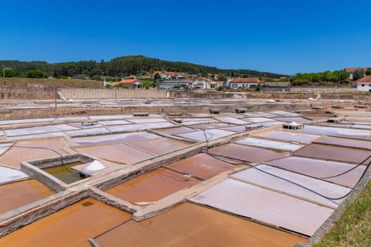 Rio Maior, Portugal: July 7, 2024: Fonte da Bica Salt Flats, aka Salinas de Rio Maior, system of shallow water compartments and gutters for salt extraction, Portugal