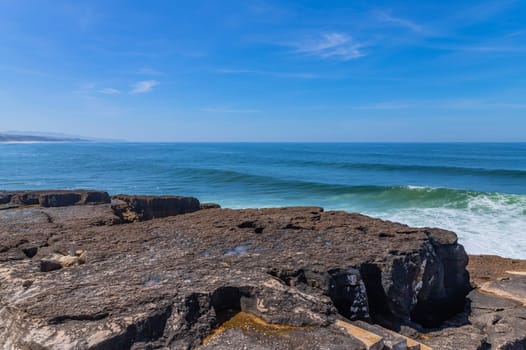View of ocean waves and fantastic rocky coast in Ericeira, near Lisbon. Portugal