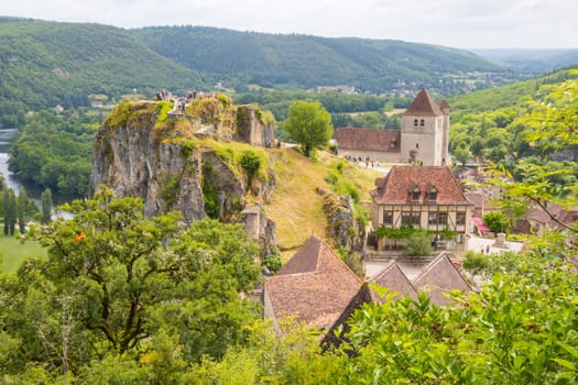 saint-cirq-lapopie, France- June 15 2024: Old cliffside village of Saint-Cirq-Lapopie in the Occitanie region, south west France