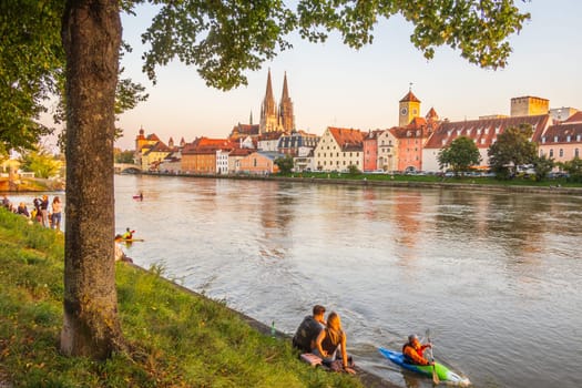 Regensburg, Germany - September 18 2024: Regensburg in Germany, view to the old town with Danube river in the foreground