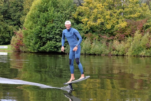 Obviously having fun: Kitsurfer Ben Beholz gives taster courses on the Messesee and does show acts in pump and wing foiling  The 63rd Interboot 2024 trade fair in Friedrichshafen has opened