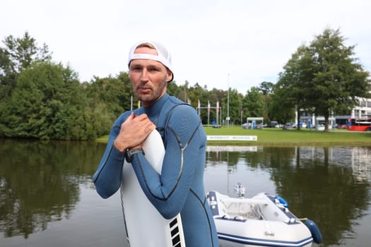 Kitsurfer Ben Beholz gives taster courses on the Messesee and does show acts in pump and wingfoiling  The 63rd Interboot 2024 trade fair in Friedrichshafen has opened