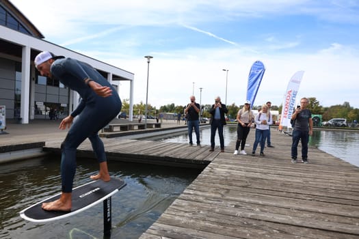 Kitsurfer Ben Beholz gives taster courses on the Messesee and does show acts  The 63rd Interboot 2024 trade fair in Friedrichshafen has opened