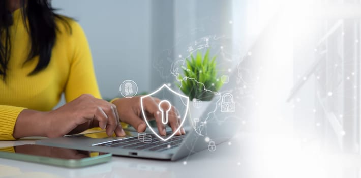 Cybersecurity and Global network security technology concept, Businesswoman protecting personal data on computer with virtual interface, Internet secure technology, Cyber security.