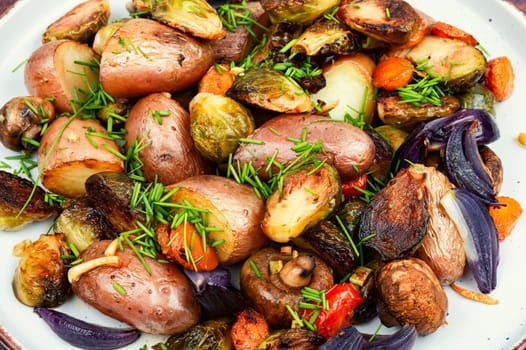 Baked potatoes, Brussels sprouts and mushrooms.