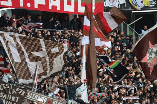 St Pauli fans in Freiburg celebrate and cheer at the match of the 1st FBL: 24-25: 1st FBL: 24-25: 5th Sptg. SC Freiburg - FC St. Pauli  DFL REGULATIONS PROHIBIT ANY USE OF PHOTOGRAPHS AS IMAGE SEQUENCES AND/OR QUASI-VIDEONann  Photo: Joachim Hahne/johapress