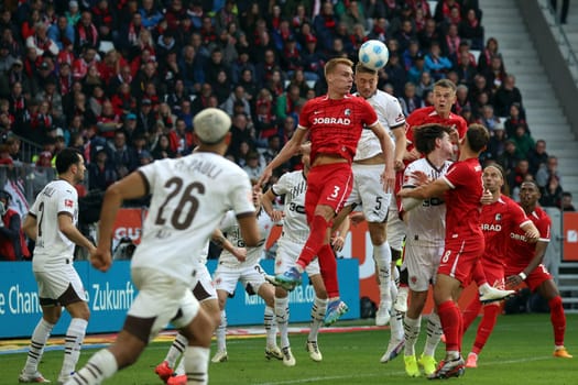 Busy in the St. Pauli penalty area,Hauke Wahl (FC St. Pauli) clears in front of Philipp Lienhart (SC Freiburg) in the match of the 1. FBL: 24-25: 1. FBL: 24-25: 5. Sptg. SC Freiburg - FC St. Pauli  DFL REGULATIONS PROHIBIT ANY USE OF PHOTOGRAPHS AS IMAGE SEQUENCES AND/OR QUASI-VIDEONann  Photo: Joachim Hahne/johapress