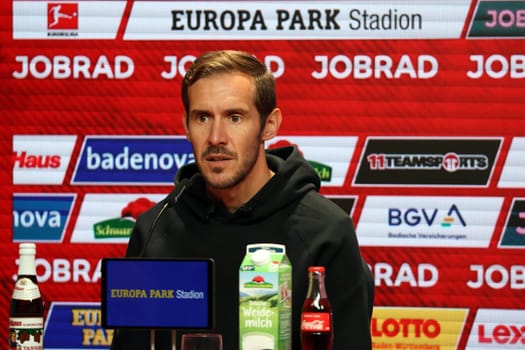 Head coach Julian Schuster (SC Freiburg) at the press conference,PK after the match of the 1st FBL: 24-25: 1st FBL: 24-25: 5th Sptg. SC Freiburg - FC St. Pauli  DFL REGULATIONS PROHIBIT ANY USE OF PHOTOGRAPHS AS IMAGE SEQUENCES AND/OR QUASI-VIDEONann  Photo: Joachim Hahne/johapress