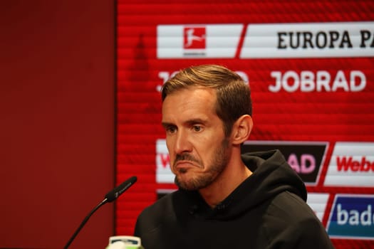 Head coach Julian Schuster (SC Freiburg) at the press conference,PK after the match of the 1st FBL: 24-25: 1st FBL: 24-25: 5th Sptg. SC Freiburg - FC St. Pauli  DFL REGULATIONS PROHIBIT ANY USE OF PHOTOGRAPHS AS IMAGE SEQUENCES AND/OR QUASI-VIDEONann  Photo: Joachim Hahne/johapress