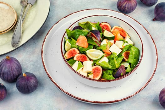 Plate of salad with fresh figs.Healthy fig salad.