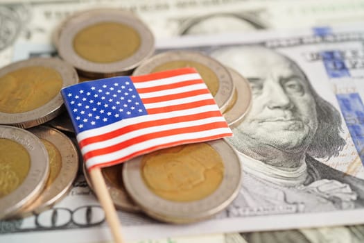 US flag on coin and banknote money, finance trading investment business currency.