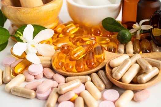 Alternative medicine herbal organic capsule with vitamin E omega 3 fish oil, mineral, drug with herbs leaf natural supplements for healthy good life.