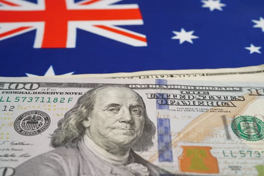 Australia flag with US dollar banknote, finance banking.
