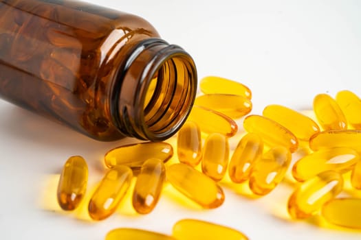 Fish oil or Cod liver oil gel in capsules with omega 3 vitamins, supplementary healthy food.