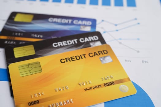 Credit card on graph paper for online shopping, security finance business.