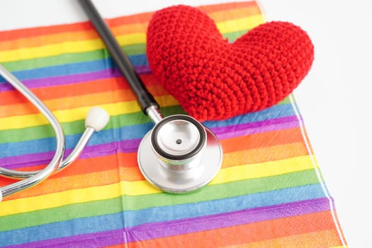 LGBT symbol, Stethoscope with red heart on rainbow flag, rights and gender equality, LGBT Pride Month in June.