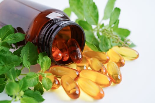 Alternative medicine herbal organic capsule with vitamin E omega 3 fish oil, mineral, drug with herbs leaf natural supplements for healthy good life.