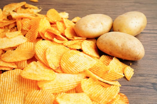Potato chips , delicious BBQ seasoning spicy for crips, thin slice deep fried snack fast food.
