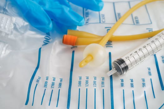 Foley catheter and urine drainage bag collect urine for disability or patient in hospital.