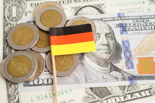 Germany flag on coins background, finance and accounting, banking concept.