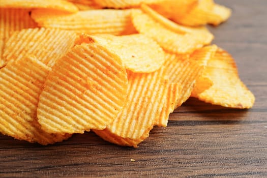 Potato chips , delicious BBQ seasoning spicy for crips, thin slice deep fried snack fast food.