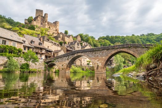 Belcastel village, castle and medieval bridge over Aveyron river, one of the most beautiful villages of France photographed in Occitanie region