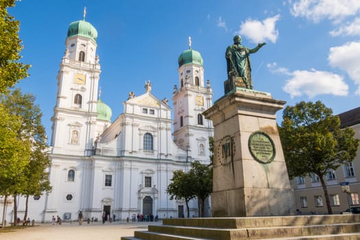 Passau, Germany- September 20 2024: St. Stephen's Cathedral and Maximilian Joseph statue in Passau, Bavaria, Germany