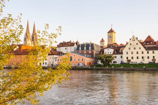 Regensburg, Germany- September 18 2024: Regensburg in Germany, view to the old town with Danube river in the foreground