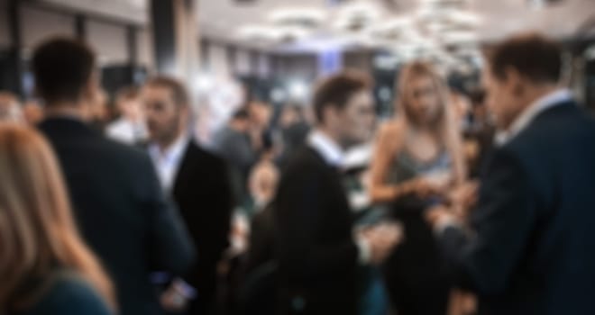 Blurred image of businesspeople at banquet business meeting event. Business and entrepreneurship events concept.