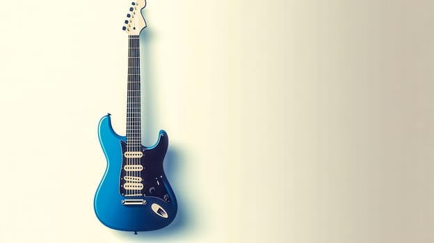 Blue electric guitar hangs on a white wall, exuding creativity and passion in music with a hint of vintage style