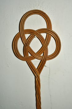 old carpet beater on a cellar wall in a German house