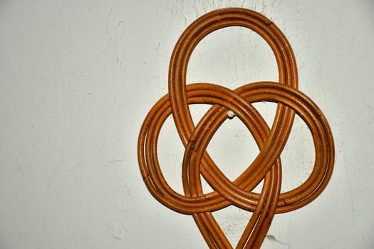 old carpet beater on a cellar wall in a German house