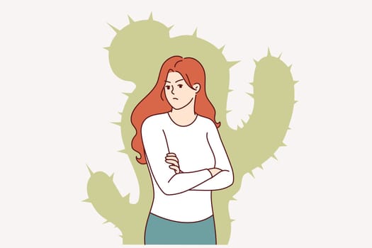 Aggressive woman with cactus silhouette suffers from lack of friends who are unwilling to tolerate toxic behavior. Aggressive lady makes dissatisfied grimace after hearing unwanted opinion