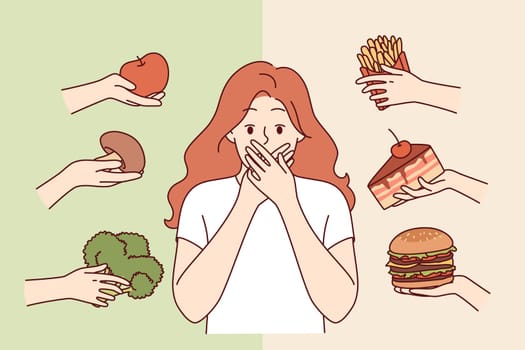 Choice between healthy and unhealthy food frightens woman