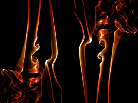 abstract colored smoke on a black background