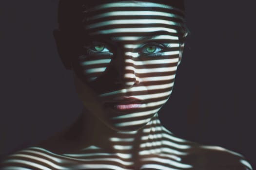 Dramatic portrait of a beautiful woman with a shadow pattern on the face and body. Female model looking at camera. Light and shadow play. Studio portrait of a beautiful young woman with shadow stripes on her face. Mood and atmosphere. Dramatic light. Personality and individuality. Sensual shot