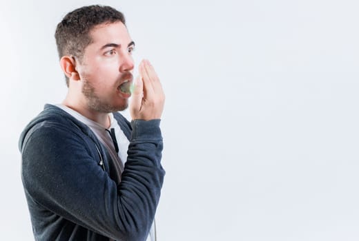 Person with bad breath problem isolated. Man with latisosis checking bad breath