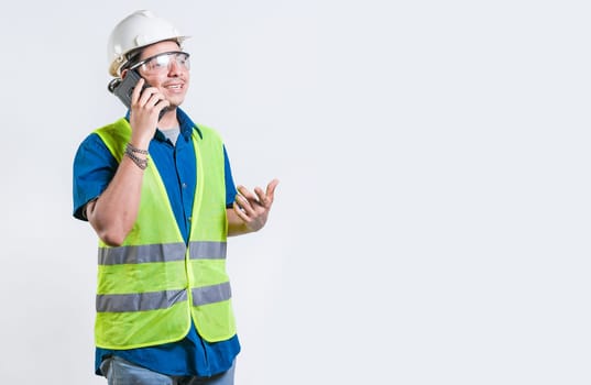 Civil engineer talking phone isolated. Young latin engineer calling on cell phone isolated