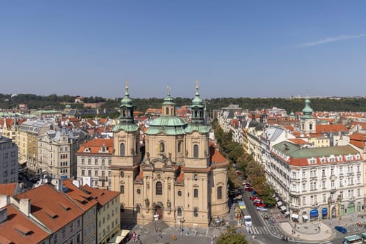 Prague, Czech Republic - September 4, 2024: Aerial view from tower of Town Hall of city with St. Nicholas Church