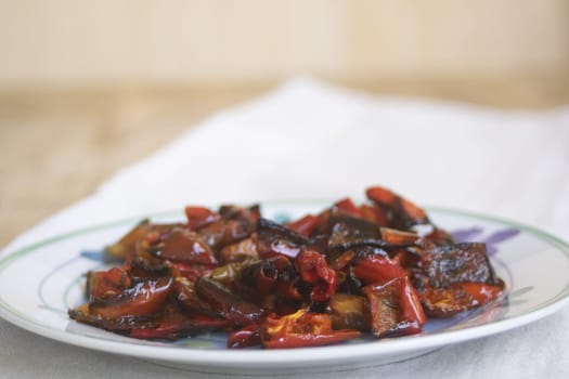 fried peppers ina white dish