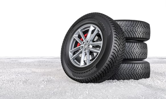 Four winter tires  on icy ground with a snowy background 3d